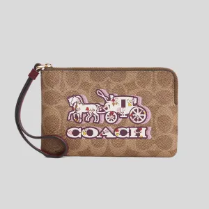 Coach Bags COACH Corner Zip Wristlet In Signature Canvas With Horse And Carriage Print CX589