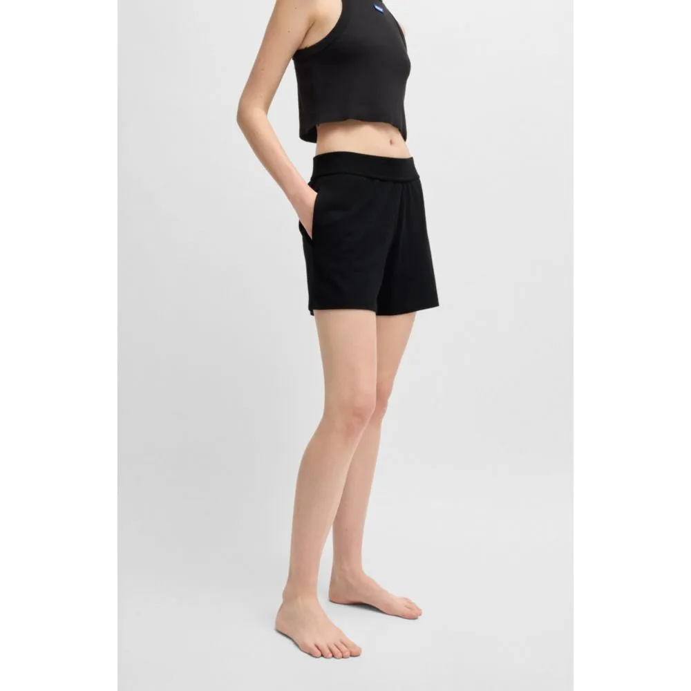 Relaxed-fit shorts with silicone-printed logo